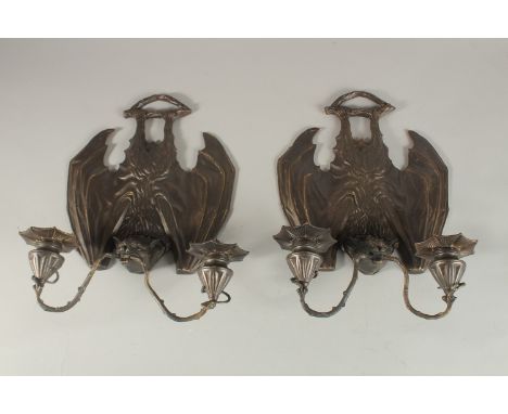 A GOOD PAIR OF BRONZE BAT TWO LIGHT WALL SCONCES. 32cms high.