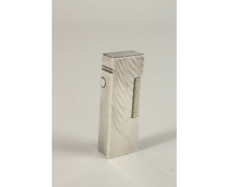 A DUNHILL SILVER LIGHTER.