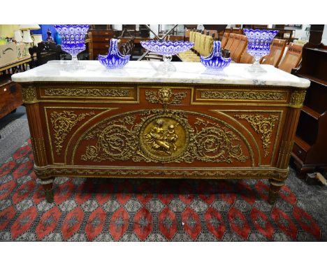 A GOOD LOUIS XVTH MARBLE TOP COMMODE, the front with three small drawers over double panel doors, the whole with good gilt me