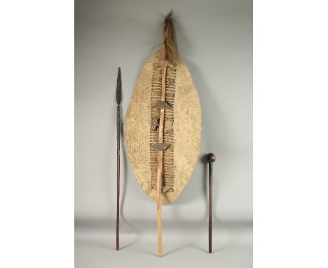 A 19TH CENTURY ZULU SHIELD, KNOBKERRIE AND AN ASSEGAI SPEAR.