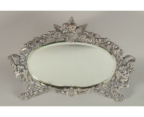 A SILVER PLATED OVAL EASEL MIRROR. Mirror 18cms x 27cms.