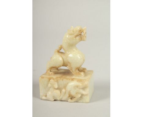 A CHINESE JADE DOG OF FO SEAL. 9cms high.
