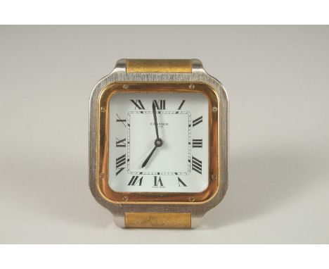 A GOOD CARTIER TRAVELLING CLOCK. Quartz, No. 7508 17637.  7cms x 7cms, in a Red Cartier folding bag.