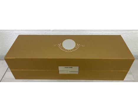 A presentation box engraved to opening button 'Cristal 2005' with a bottle of 2009 Louis Roederer Cristal champagne still in 