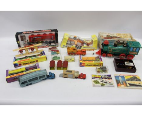 Mixed lot of diecast toys - to include boxed Matchbox Superkings, unboxed Dinky, Tonka Toy, battery-operated locomotive