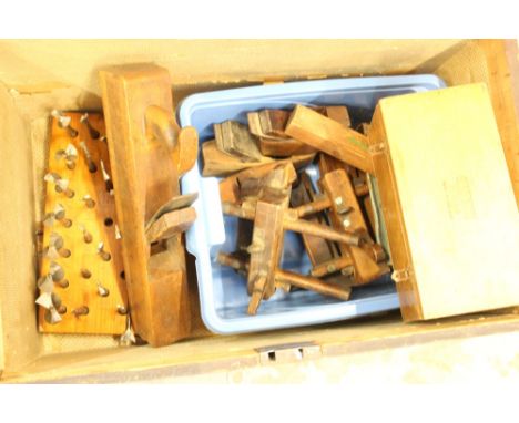 Collection of old carpenters' tools in pine tool trunk