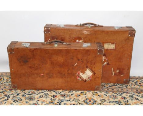 Vintage luggage - two large leather suitcases with part luggage labels remaining, 15cm x 90cm x 47cm and 15cm x 90cm x 59cm a