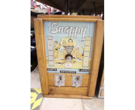 Rare vintage penny slot machine, titled 'Snappy', with fortune telling theme, central rotating dial with choice of questions 