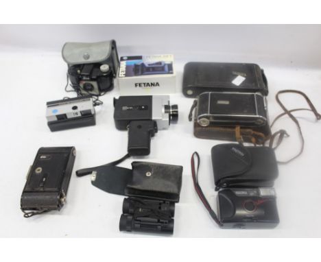 Collection of vintage binoculars and cameras, binoculars by Pentax and other makers, various cameras - including Voigtländer,