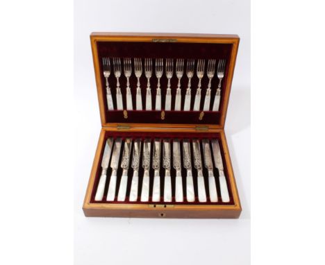 Simulated mother of pearl canteen of fish knives and forks with silver collars and wooden case