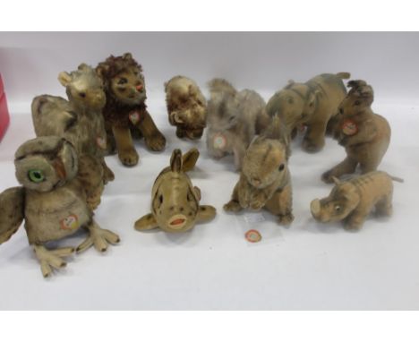 Steiff soft toy selection circa 1940s and 50s period with chest tags 'Nopsy' Rhinoceros, 'Leo' Lion, 'Mockie' Hippopotamus, L