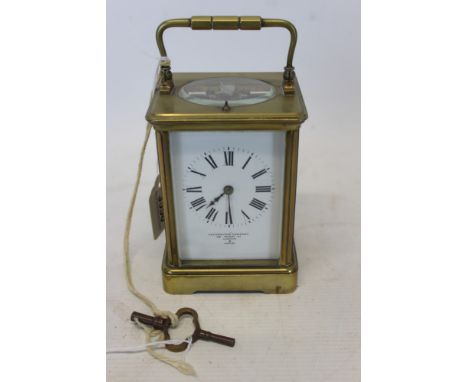 Late 19th / early 20th century carriage clock with eight day repeat movement and lever escapement, striking on a gong, white 