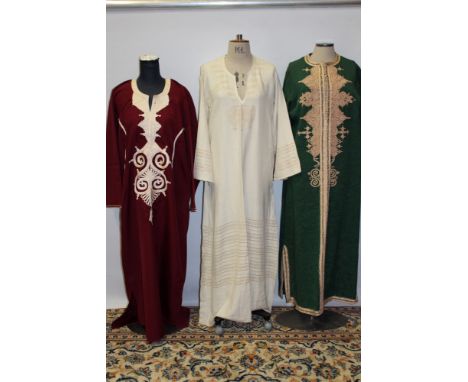 Three vintage Arabic kaftans - green with gold silk braid attached by hand, similar mauve with cream braiding, the third is c