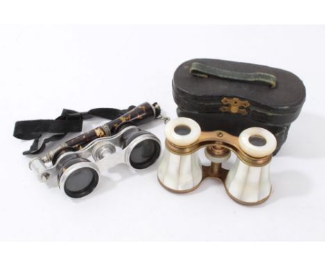 Pair of mother of pearl opera glasses in fitted case and one other pair