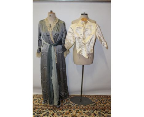 Ladies' Victorian cream satin silk fitted and boned bodice with twenty-six buttons and pointed waistline, plus a bone silk go