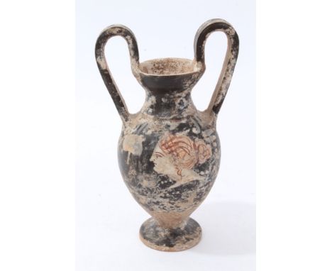 Early Southern Italian Attic pottery vase of baluster form, with twin surmounting handles, printed with relief portrait of a 