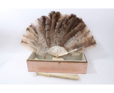 Two 19th century fans - one is ostrich feather and mother of pearl sticks and guards - said to have been mounted by Duvellero