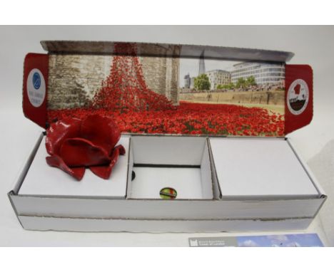 Paul Cummins, original ceramic poppy, one of 888246 poppies made for the art installation 'Blood Swept Lands and Seas of Red'