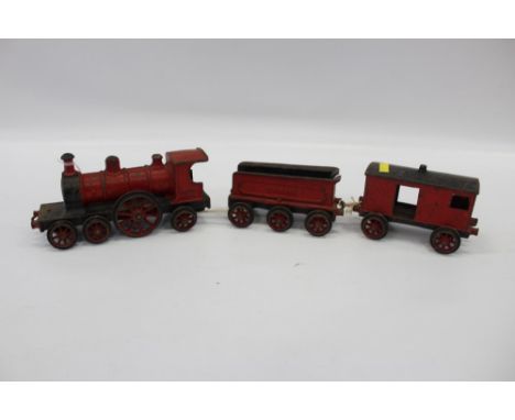 Vintage cast iron locomotive tender and carriage