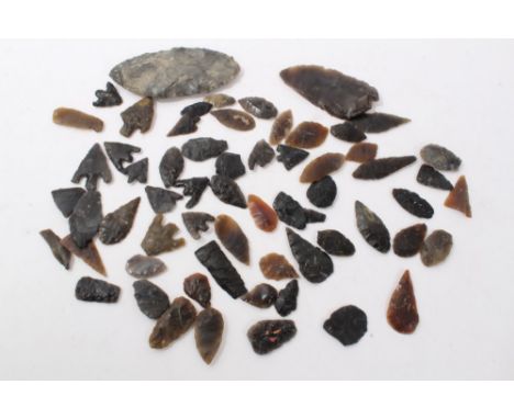 Good collection of finely worked Neolithic flints, predominantly arrow-heads, a fine leaf-shaped axe-head, 10cm long and othe