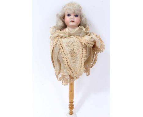 Doll, late 19th century Poupard (puppet) doll Armand Marseille bisque, hand marked Germany 370 A 11/OM, on turned wooden stic