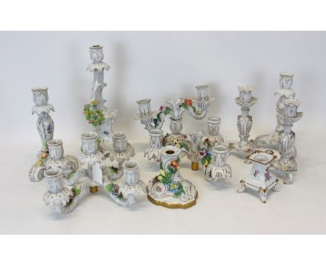 Selection of Dresden and similar candlesticks and candelabra with floral encrusted decoration