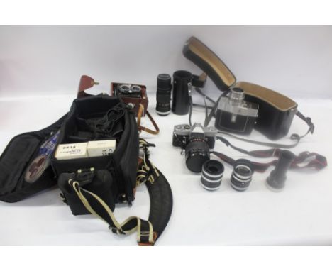 Cameras and photographic equipment - including a Canon FT 35mm SLR with 50mm and 500mm lenses and related accessories, a Cano