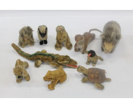 Steiff small soft toys selection circa 1940s and 50s period witjh chest tags, 'Poggi' Penguin, 'Snucki' Goat, 'Slo' Tortoise,