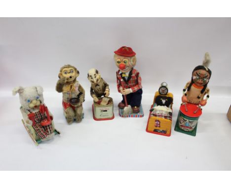 Collection of vintage battery-operated automata - including sweeping clown, bubble blowing monkey, rocking rabbit, sleeping b