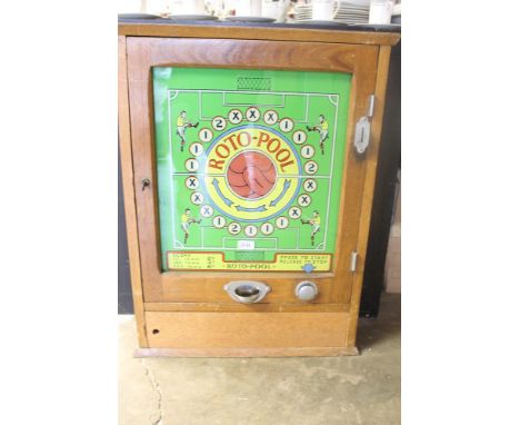 Rare vintage 'Roto-Pool' penny slot machine, decorated glass front, in oak case, 75cm high CONDITION REPORT key present, elec