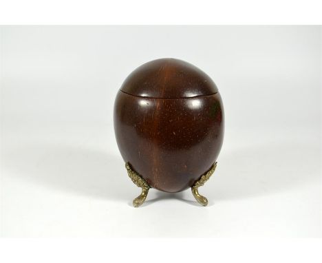 A coconut tea caddy with silver plate mounts. Circa 1900. Height 14cm.