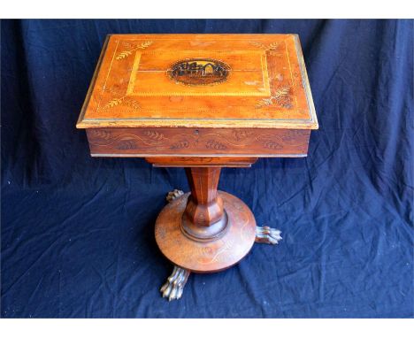 An Irish yew wood Killarney work table inlaid with shamrocks and a central panel, ruins of an abbey circa 1870. Width 42cm He