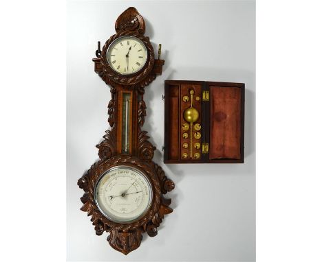 A wooden banjo barometer, circa 1900, and a boxed Sikes hydrometer. (2)