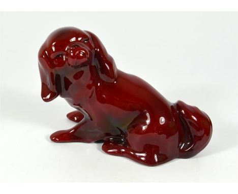 A Royal Doulton flambe model of a Pekinese. Circa 1920. Printed marks. Height 9cm.
