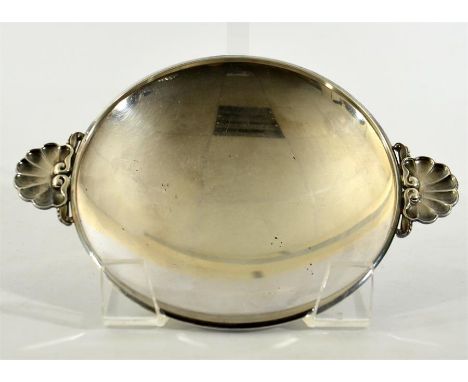 A small sterling silver dish with shell motif handles, design #355B from 1929 by Gundorph Albertus Jensen. Hallmarks from 194