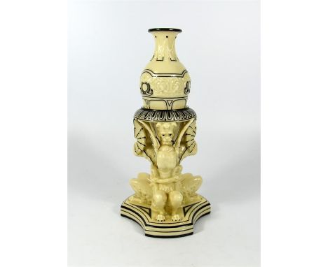 A Royal Worcester amphora vase, in a stand with three griffins. Printed mark, circa 1880. Height 24cm.