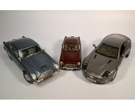 Three Aston Martin Model Cars including the DB5 and Vanquish, from the James Bond film series; Aston Martin DB5 1963 1:18 Mod