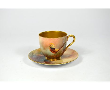 A Royal Worcester cup and saucer, decorated with Chinese pheasants. Signed by Sedgley. Date code 1926.