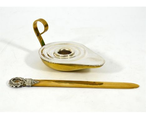 A silver and brass chamber stick, with a brass and white metal letter opener, silver marked 925.