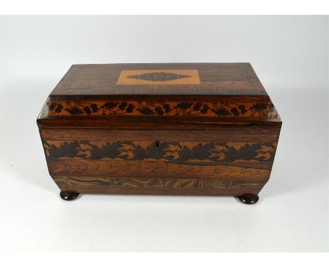 A rosewood Tunbridge ware tea caddy, with an abstract panel to the top. Marble sliced veneer banding. Interior with a Tunbrid