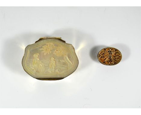 A white metal snuff box with carved abalone and a filigree box. (2)