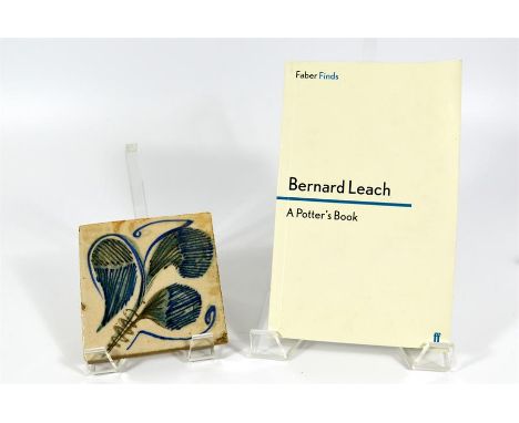A 1930s Bernard Leach pottery 'colourway testing' tile, annotated and impressed to rear. Includes copy of his book. (2)
