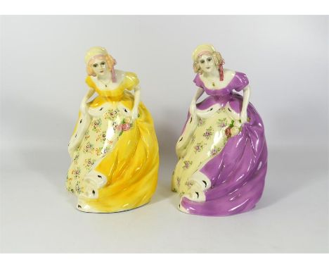 Two Goldscheider figures of women in long dresses, marked Goldscheider Wien. Height 22cm. (2)