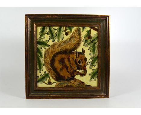 A Cobridge stoneware tile with hand-painted squirrel. Framed. Impressed marks. Tile 21cm.