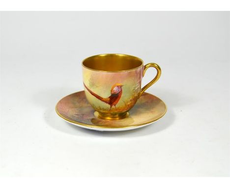 A Royal Worcester cup and saucer, decorated with Chinese pheasants. Signed by Sedgley. Date code 1926.