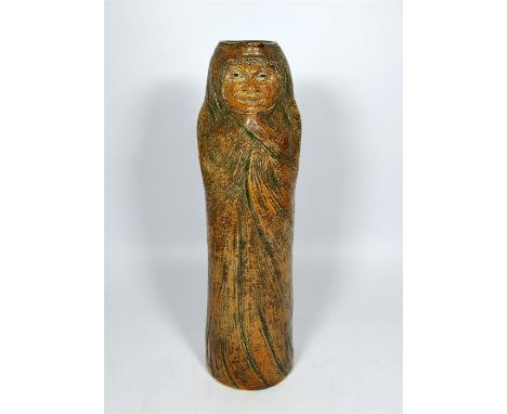 A Martin Brothers Eskimo jug, by R.W.Martin signed R W Martin London and Southall, dated 14.9.1903. Height 36cm.