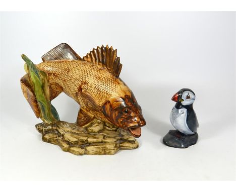 A Burslem pottery fish and Anita Harris model of a penguin. Printed and impressed marks. Height 20cm