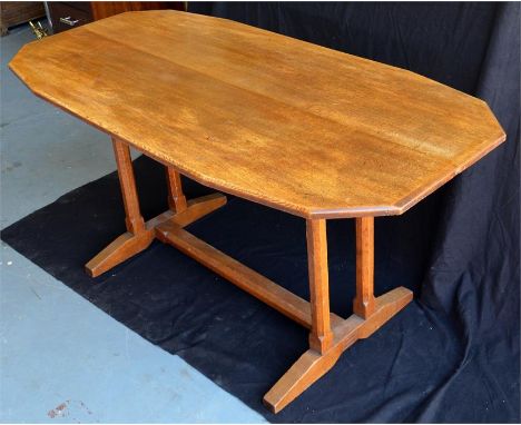 A Cotswold school oak refectory table. Circa 1950. Width 150cm. Height 74cm.