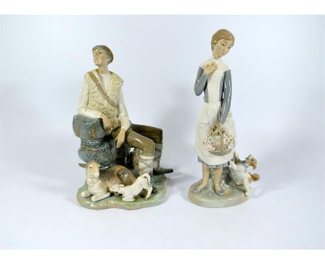 Two figures, one Lladro and one Nao figure. Lladro Shepherd boy and a Nao girl with ducks. Height 26cm. (2)