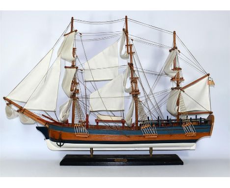 A model of HMS Endeavour with string rigging and cloth sails. Total length 83cm